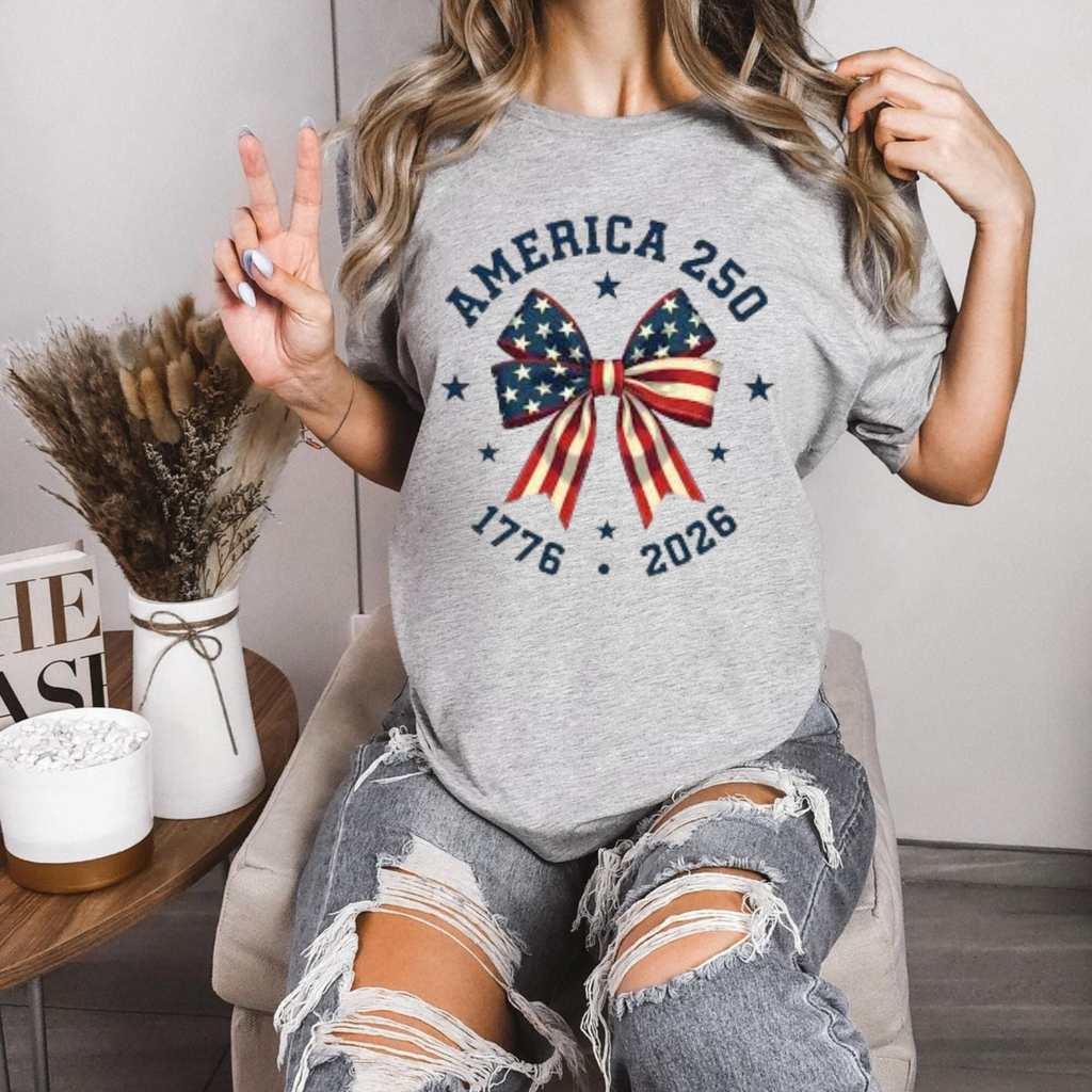 America 250 Stars and Stripes Bow T-Shirt – Coquette Patriotic Graphic Tee